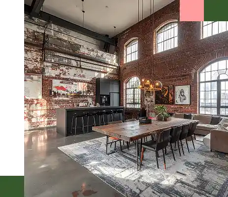 Grote, lichte keuken in loftstijl met hoge plafonds en grote ramen in donkere tinten.